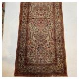 PERSIAN RUNNER | Flowery devices on a beige field, hand made and appearing in very good condition; 1