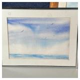 a seascape with a blue sky and birds, and a beach scene and seascape with perched bird in matching f