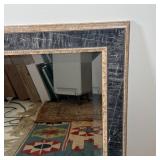 BEVELED GLASS MIRROR | Wall mirror with a faux stone frame; overall 29-1/2 x 41 in.