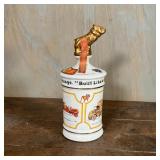 liquor bottle with a gilt bull dog stopper, 1975, 75th anniversary commemorative- apparently unopene