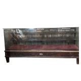 LONG DISPLAY CABINET | Vintage display cabinet with shell carving, having a velvet interior with two