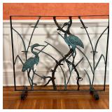 cast iron frame with outset rings for mounting glass votives, or possibly plant pots, appearing in e