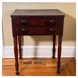 ANTIQUE TWO DRAWER STAND | With two drawers over turned legs; h. 28-1/4 x w. 22 x d. 18-1/2 in.