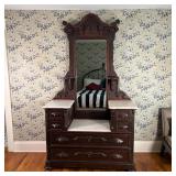 VICTORIAN MARBLE TOP DRESSER | Having two banks of drawers centering a white marble topped vanity su