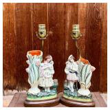 PAIR SPILL VASE LAMPS | Staffordshire spill vase figures of girls, each holding a dog, mounted as la