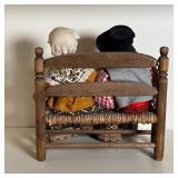 Provence Santon doll of husband and wife farmers with detailed clothing, seated on a bench, no appar