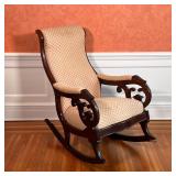 MAHOGANY ROCKING CHAIR | Antique rocking chair with a carved wood frame, upholstered seat, backrest,