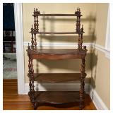 ANTIQUE ETAGERE | Turned and carved wood, on casters; h. 50 x w. 33-3/4 x d. 13-1/2 in.