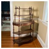 ANTIQUE ETAGERE | Turned and carved wood, on casters; h. 50 x w. 33-3/4 x d. 13-1/2 in.