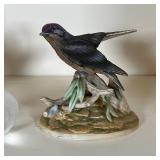 paperweight with mouse signed indistinctly, and a lidded porcelain dish decorated with pink garlands