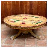 PETER HUNT LOW TABLE | Round top low table with overall paint decoration; h. 16-1/4 x dia. 42 in.