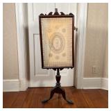 ILLUSTRATED FIRE SCREEN | Decorated with drawn/ painted patterns on paper, ornate frame on a tripod 