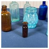 (8pc) ANTIQUE GLASS | Antique glass bottles and vessels; tallest h. 6 in.