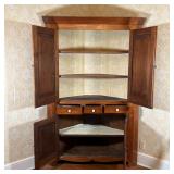 American Cherry, double cabinet doors over three drawers, over lower cabinet doors, canted corners, 