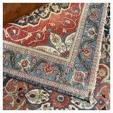 ANTIQUE MEDALLION CARPET | Having a central medallion with eight ballooning flowers, overall pattern