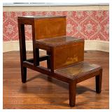 LIBRARY STEPS | Each step with inset brown leather, top step with a hidden drawer; 27 x 29 x 15-1/2 