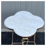 FRENCH STYLE PATIO TABLE | Cloverleaf marble top over a twisted iron form base; h. 30 x 24 x 24 in.