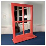 PAINTED WINDOW MIRROR | Red-painted window mirror with a lower ledge; h. 30 x w. 22 x d. 6-1/2 in.