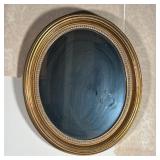 OVAL MIRROR | Within a gilt frame with interior beaded decoration; h. 20 x 18 in.