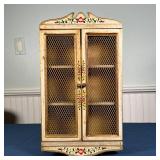 SMALL PAINTED WALL CABINET | Having two doors, paint decorated with flowers with three shelves; h. 1