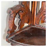 HANGING CORNER WALL SHELF | Carved wood in a leafy vine pattern; h. 17 x 8 x 8 in.