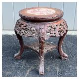 CHINESE LOW TABLE | Carved wood with an inset soapstone top; h. 13 x dia. 14 in.