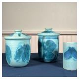 (3pc) BLUE SLIP POTTERY | Including a pair of lidded jars and a single cylindrical vase; largest h. 