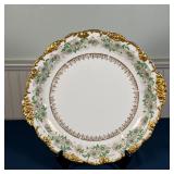 Limoges bread dish decorated with garlands and baskets of flowers, and a Limoges serving platter