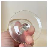 SET GILT STEMWARE | With goblets, sherry glasses, and cordial glasses, all with gilt scrollwork rims