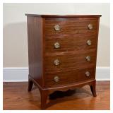  four full-width drawers with double brass pulls over a sculpted apron; h. 31 x w. 22-1/2 x d. 18-1/