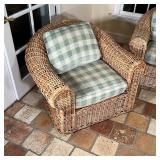  a pair of armchairs (h. 31 x 41 x 40 in.) and an ottoman [minor cracking to armchairs - could be wo