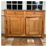 ANTIQUE PINE SIDE CABINET | Having two drawers over two cabinet doors ; h. 38 x 56 x 17 in. [water d