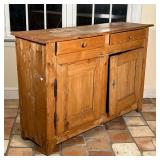 ANTIQUE PINE SIDE CABINET | Having two drawers over two cabinet doors ; h. 38 x 56 x 17 in. [water d