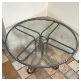 EARLY PATIO TABLE | Mottled glass top, tubular frame; h. 25 x dia. 47 in.