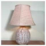 STONEWARE POTTERY LAMP | Art pottery lamp with a linen shade; overall h. 24 x dia. 16 in. [tested an