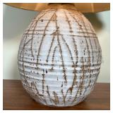 STONEWARE POTTERY LAMP | Art pottery lamp with a linen shade; overall h. 24 x dia. 16 in. [tested an