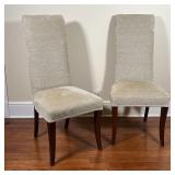 PAIR UPHOLSTERED SIDE CHAIRS | High back side chairs on splayed legs, nicely upholstered with a text