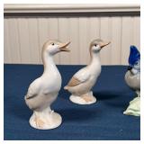 a pair of Japanese porcelain ducks (h. 4-3/4 in.) and two blue birds, apparently unmarked