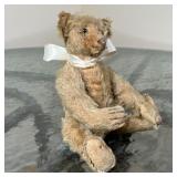 (3pc) CIRCUS & OTHER TOYS | Including an Alps Japan clown figure on a tin barrel, a Japanese tin lio