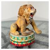 (3pc) CIRCUS & OTHER TOYS | Including an Alps Japan clown figure on a tin barrel, a Japanese tin lio