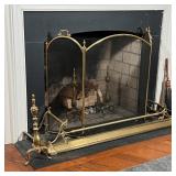 Chippendale style andirons (tallest h. 21 in), a fireplace screen, and a brass fender