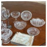 tealight candle holders, cut crystal dishes, place card holders, and other