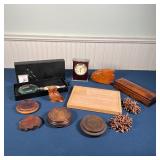 GROUP WOOD AND OTHER ITEMS | Including a Howard Miller desk clock, a whetstone in a lidded wood case