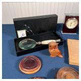 Howard Miller desk clock, a whetstone in a lidded wood case (l. 9-1/2 in.), four wood stands, a pair