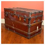 Bal Professional Steamer Trunks, New York; wood and iron bound, with red-paint and crown-form bandin