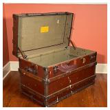 wood and iron bound, with red-paint and crown-form banding; h. 26 x w. 40 x d. 21-3/4 in.