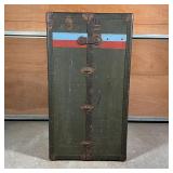 Upright, with painted stripes and initials "M.F." and with old stickers from various destinations - 