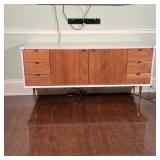 White lacquered exterior with natural wood doors and drawer fronts, soft-close drawers, leather pull