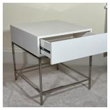 WEST ELM BEDSIDE STAND | White lacquered drawer and case on a chrome frame; h. 22 x 20 x 22 in.