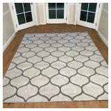 CONTEMPORARY CARPET | Grey pattern on a beige field; 7 ft. 10-1/2 in. x [some staining]